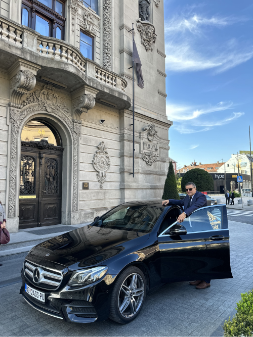 Workers in front of their vehicles